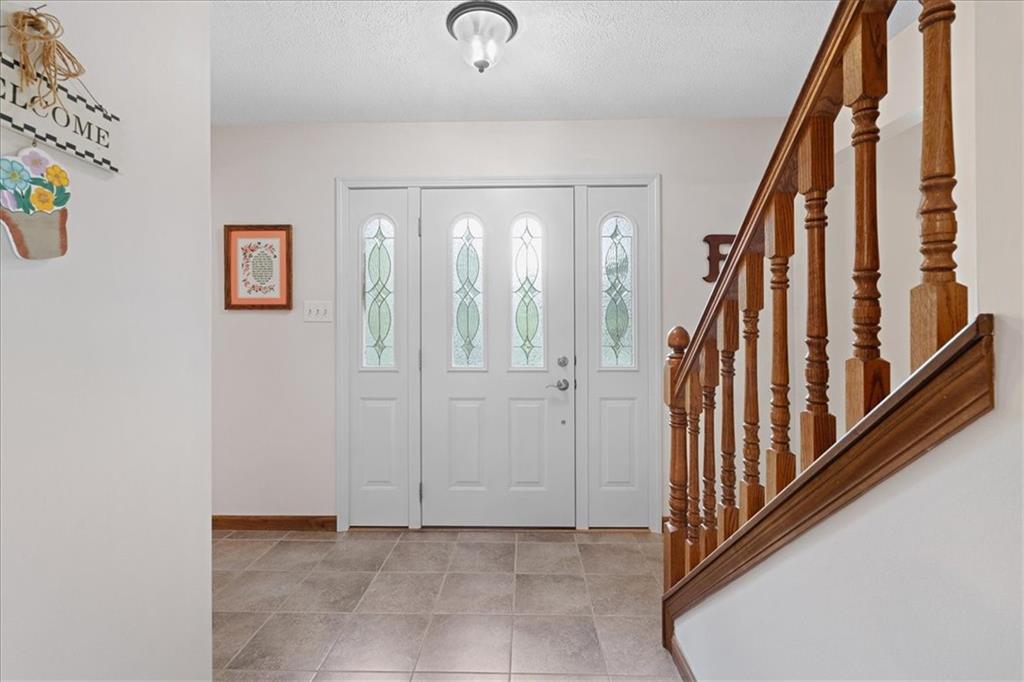94 Firethorn Road Baden, PA 15005 - Photo 3 of 42 a view of an entryway with wooden floor