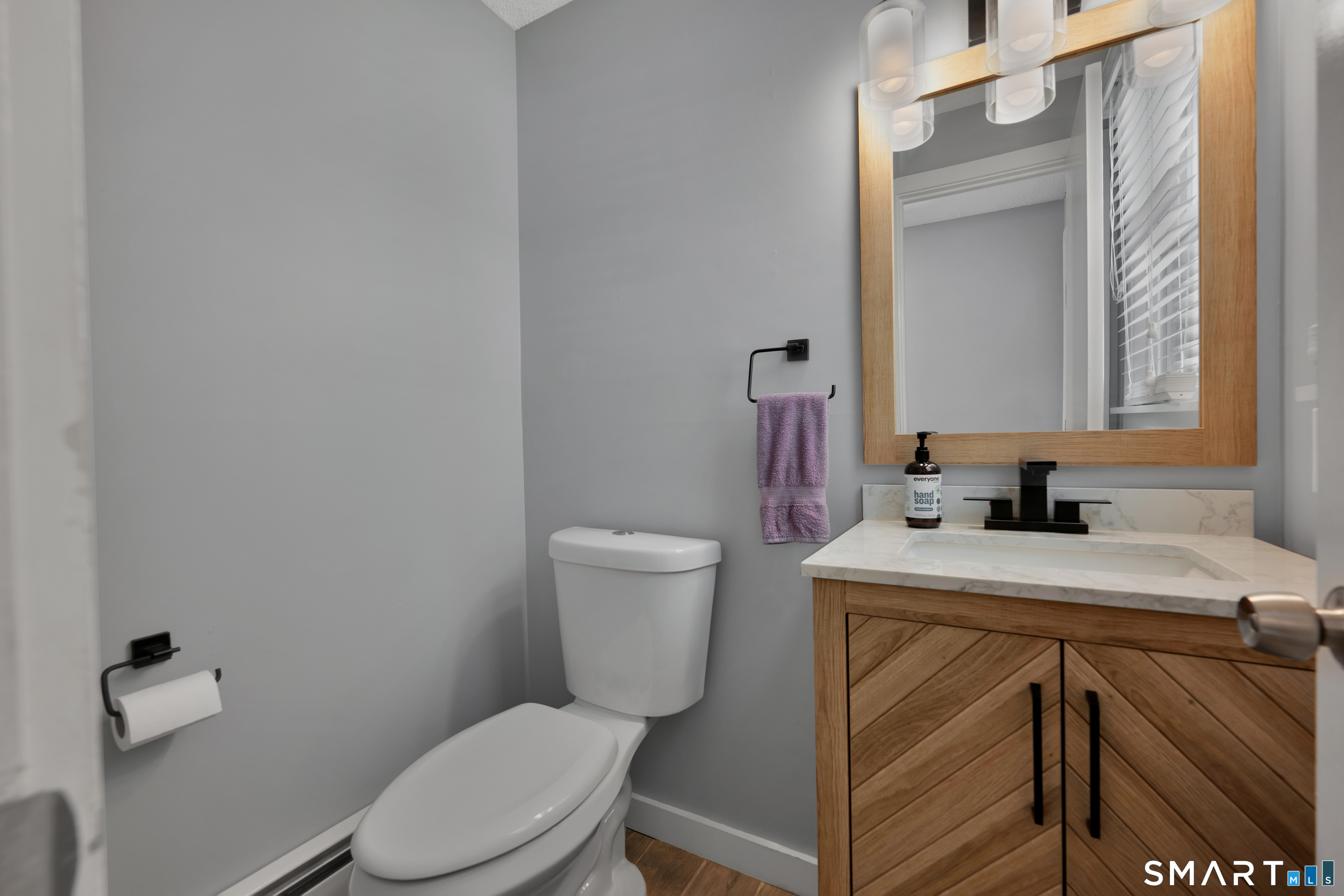116 Canton Road Granby, CT 06035 - Photo 14 of 29 a bathroom with a sink a toilet and a mirror