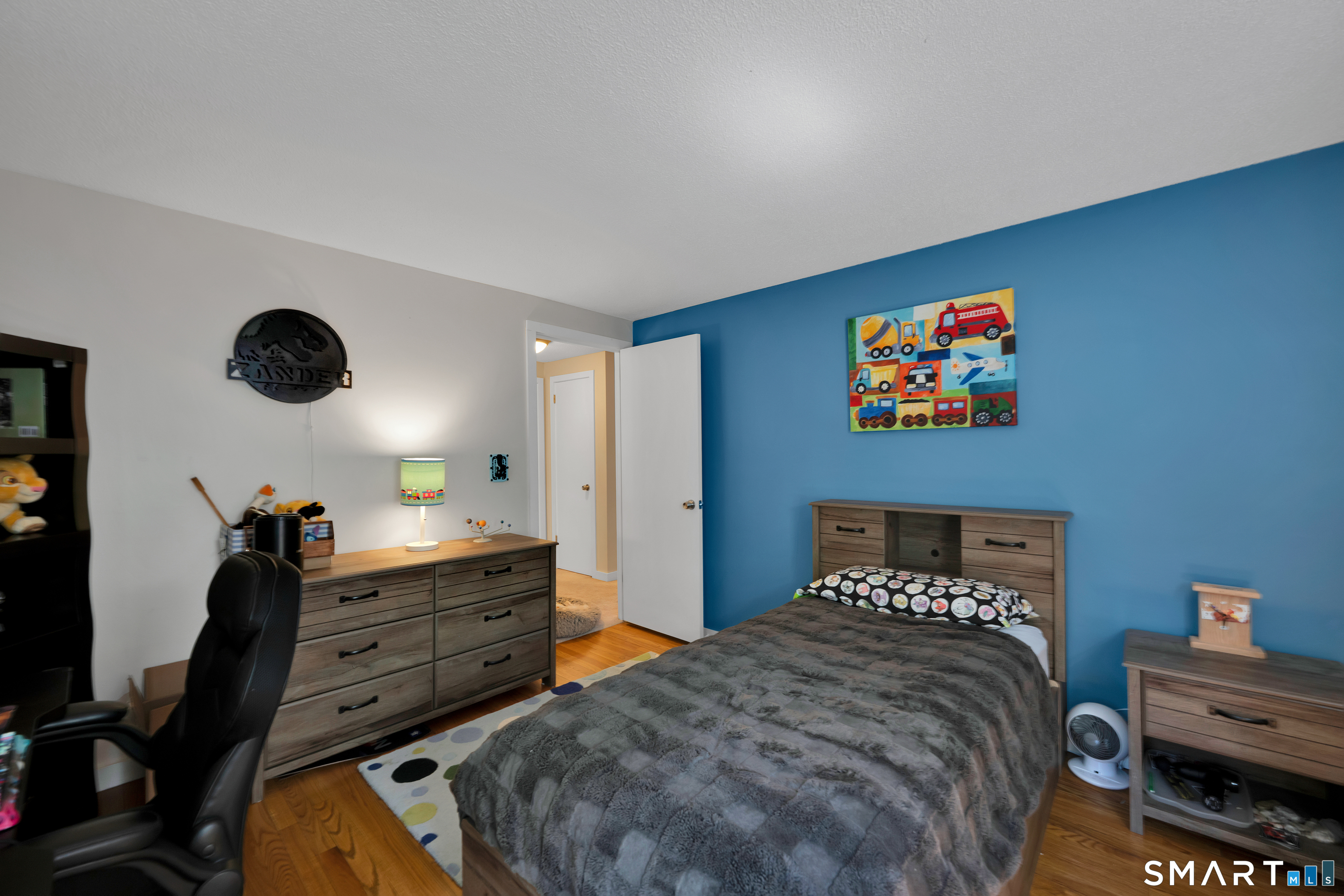 116 Canton Road Granby, CT 06035 - Photo 20 of 29 a bed room with a bed and a television