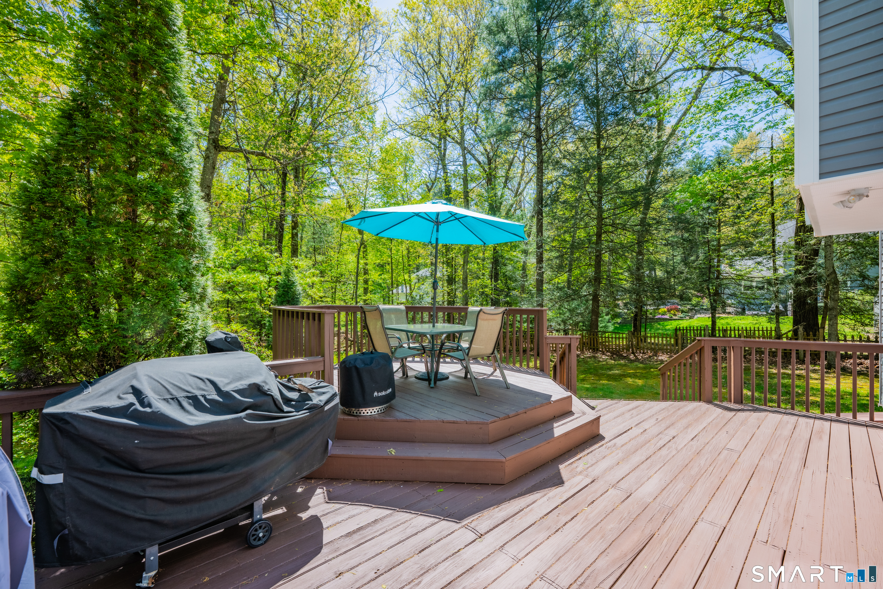 116 Canton Road Granby, CT 06035 - Photo 26 of 29 a view of a table and chairs on the roof deck