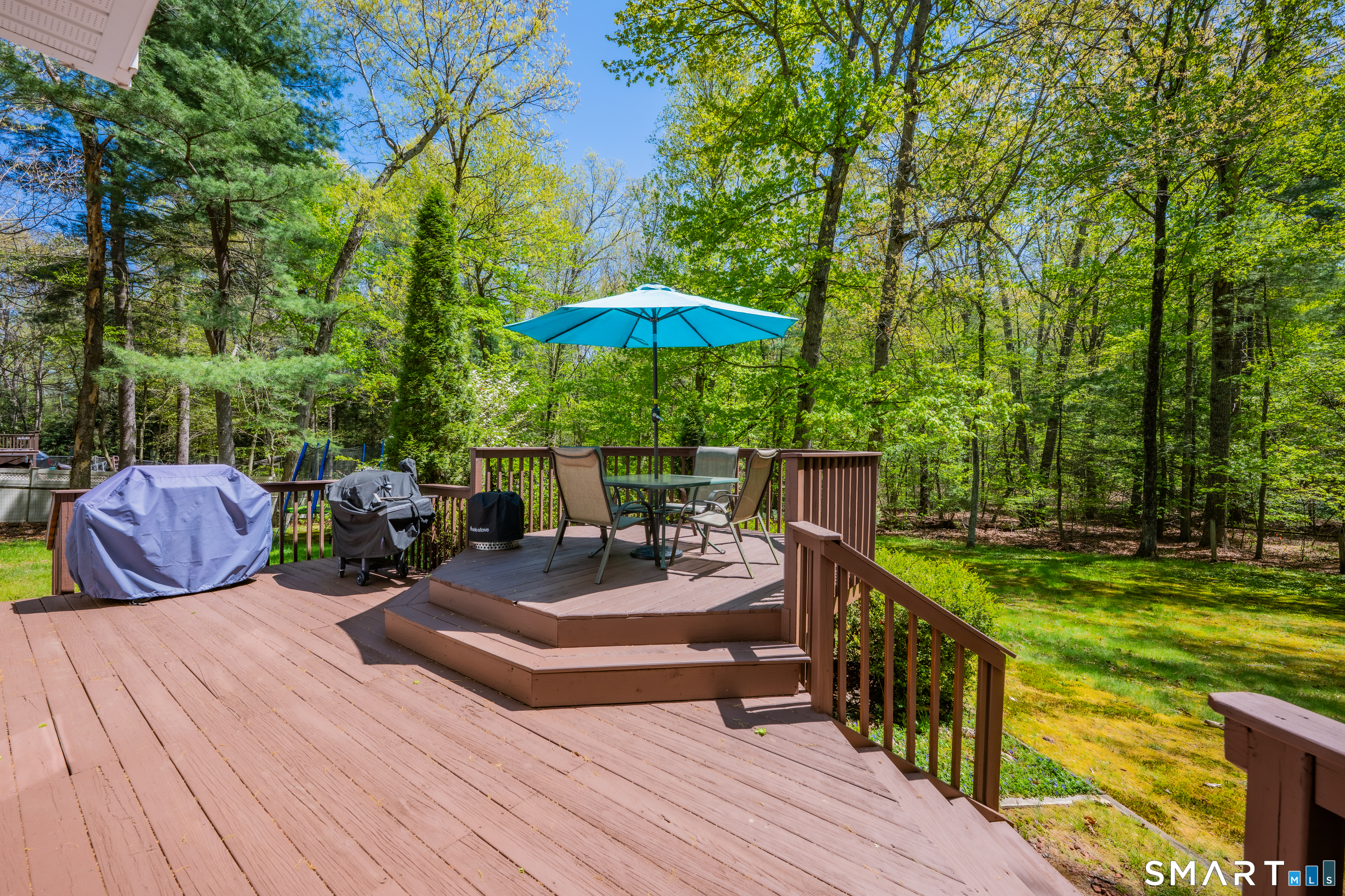 116 Canton Road Granby, CT 06035 - Photo 27 of 29 a view of a backyard with sitting area and furniture
