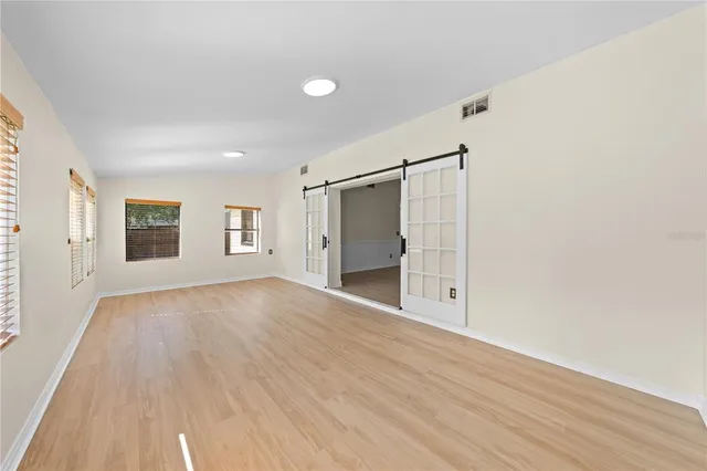 an aerial view of residential houses with swimming pool