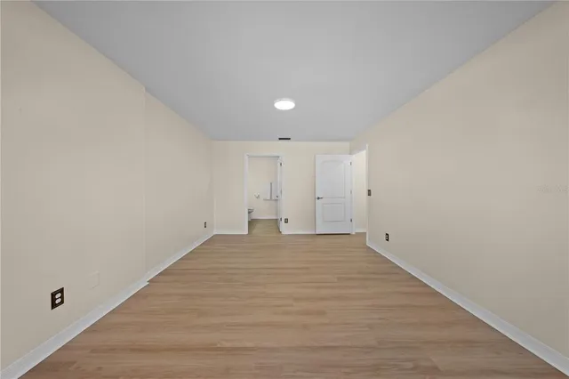 a front view of a house with yard swimming pool and outdoor seating