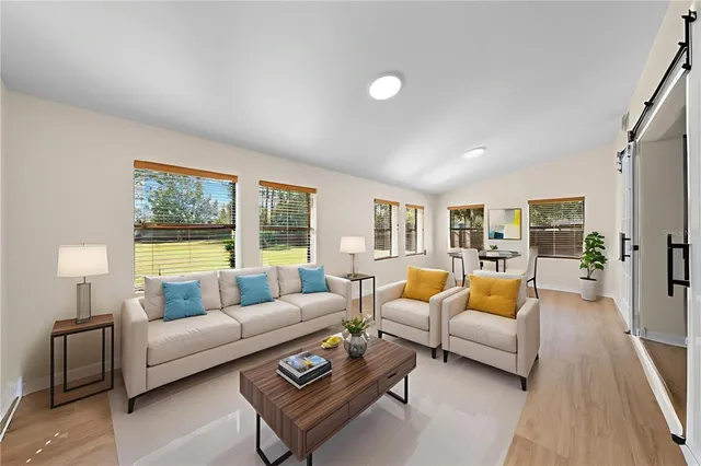 a kitchen with stainless steel appliances granite countertop a stove and a sink