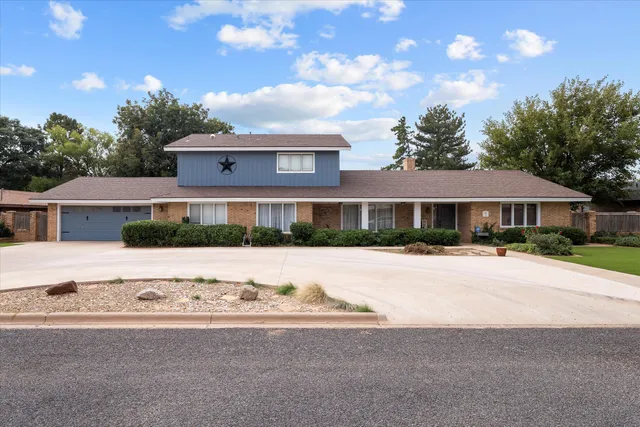 a front view of house with yard