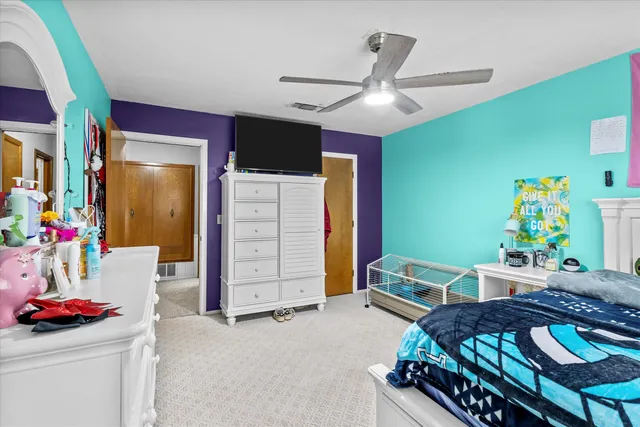 a kitchen with stainless steel appliances a stove a refrigerator and a sink