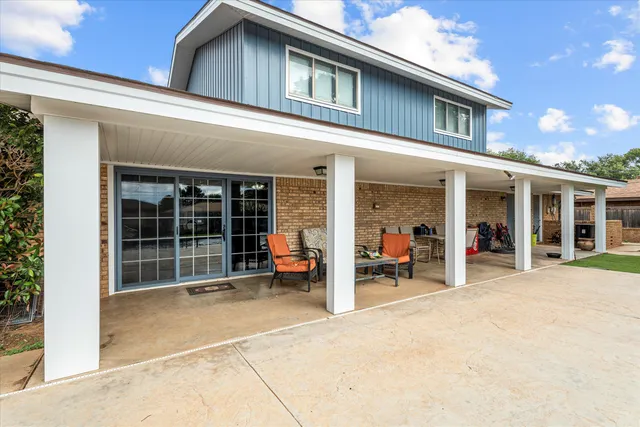 a view of a house with door and porch