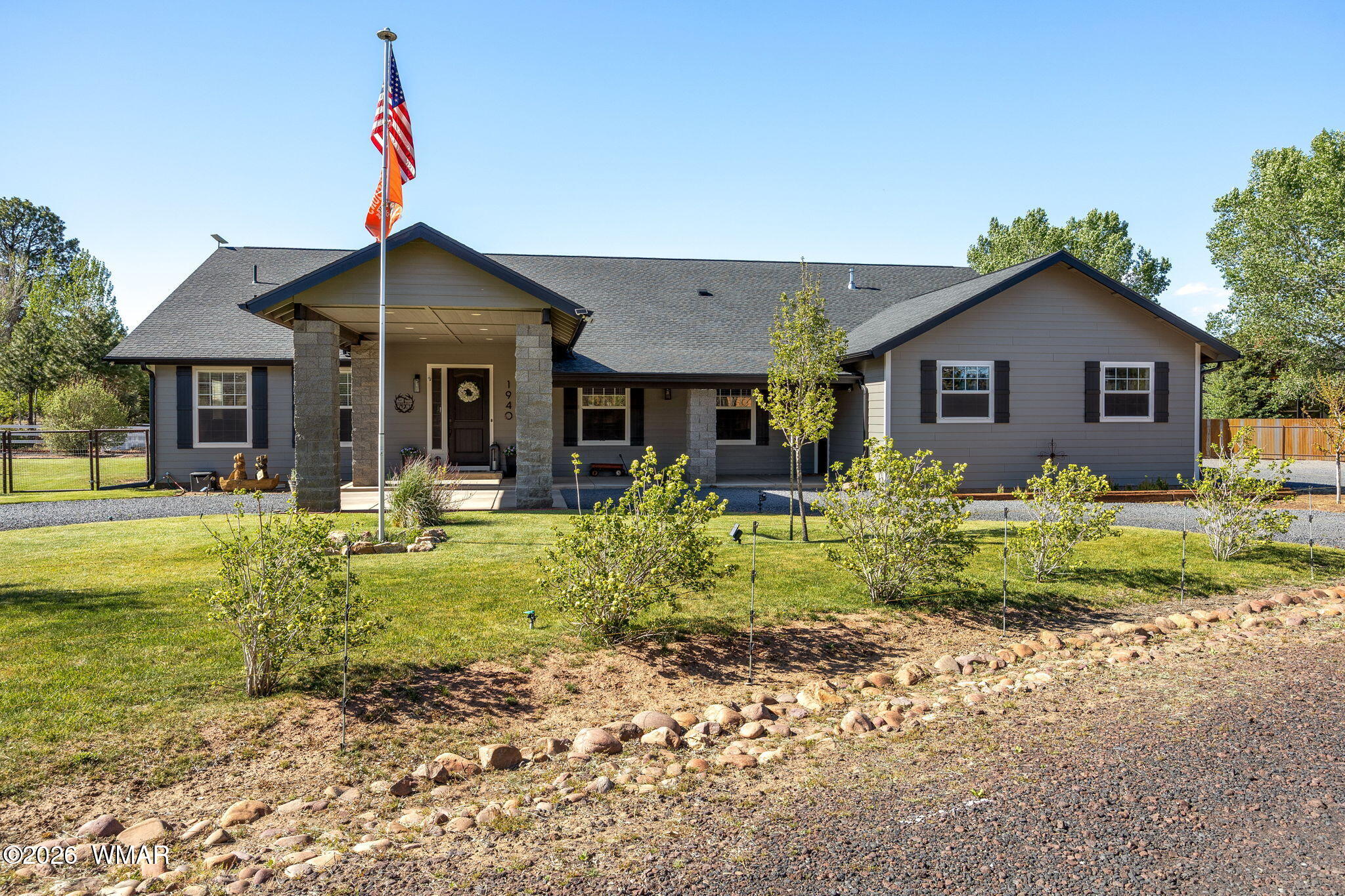1940 Stonegate Way Heber, AZ 85928 - Photo 1 of 62 a front view of house with yard and green space
