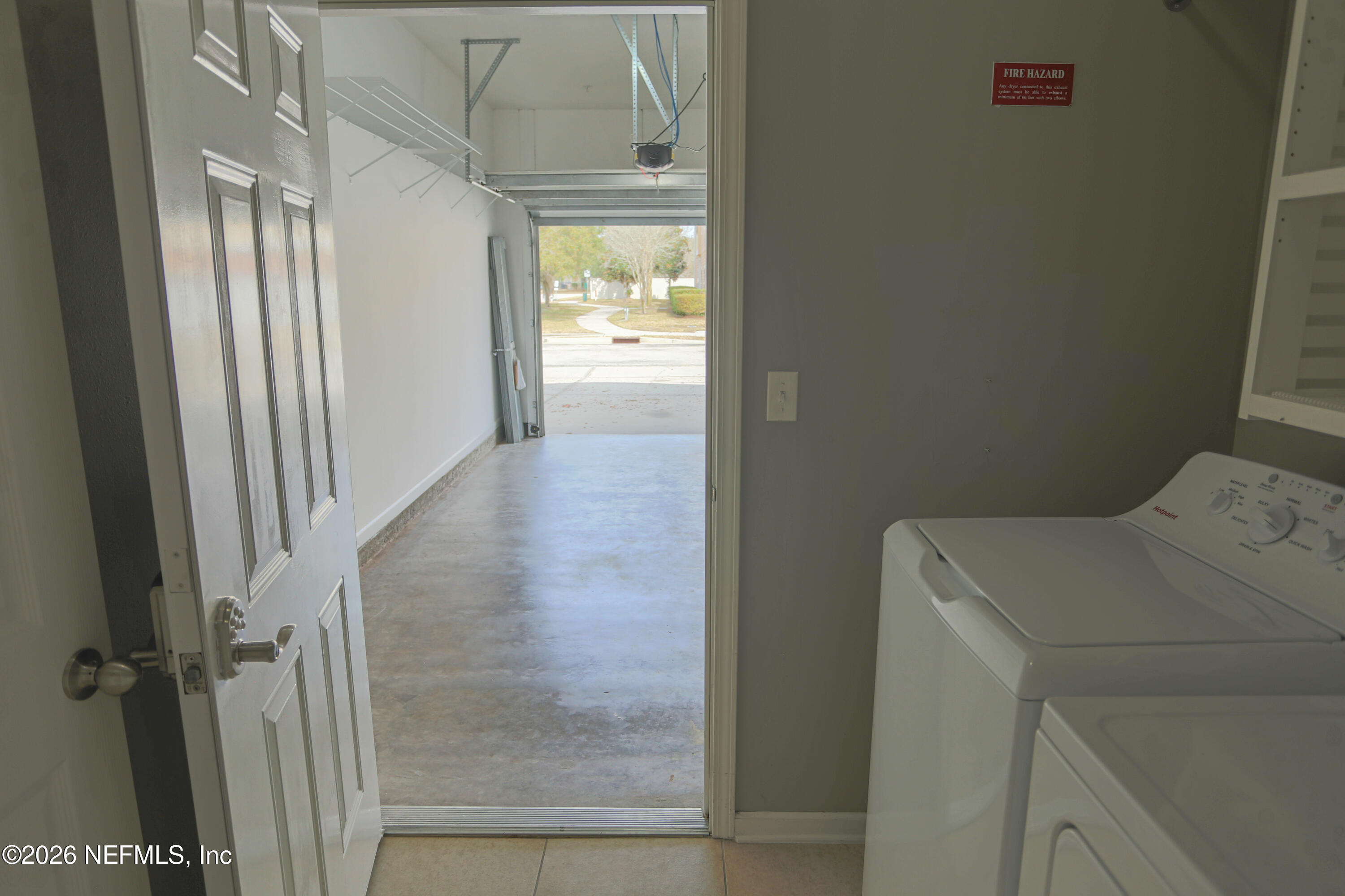 904 Golden Lake Loop St. Augustine, FL 32084 - Photo 26 of 43 Laundry to garage