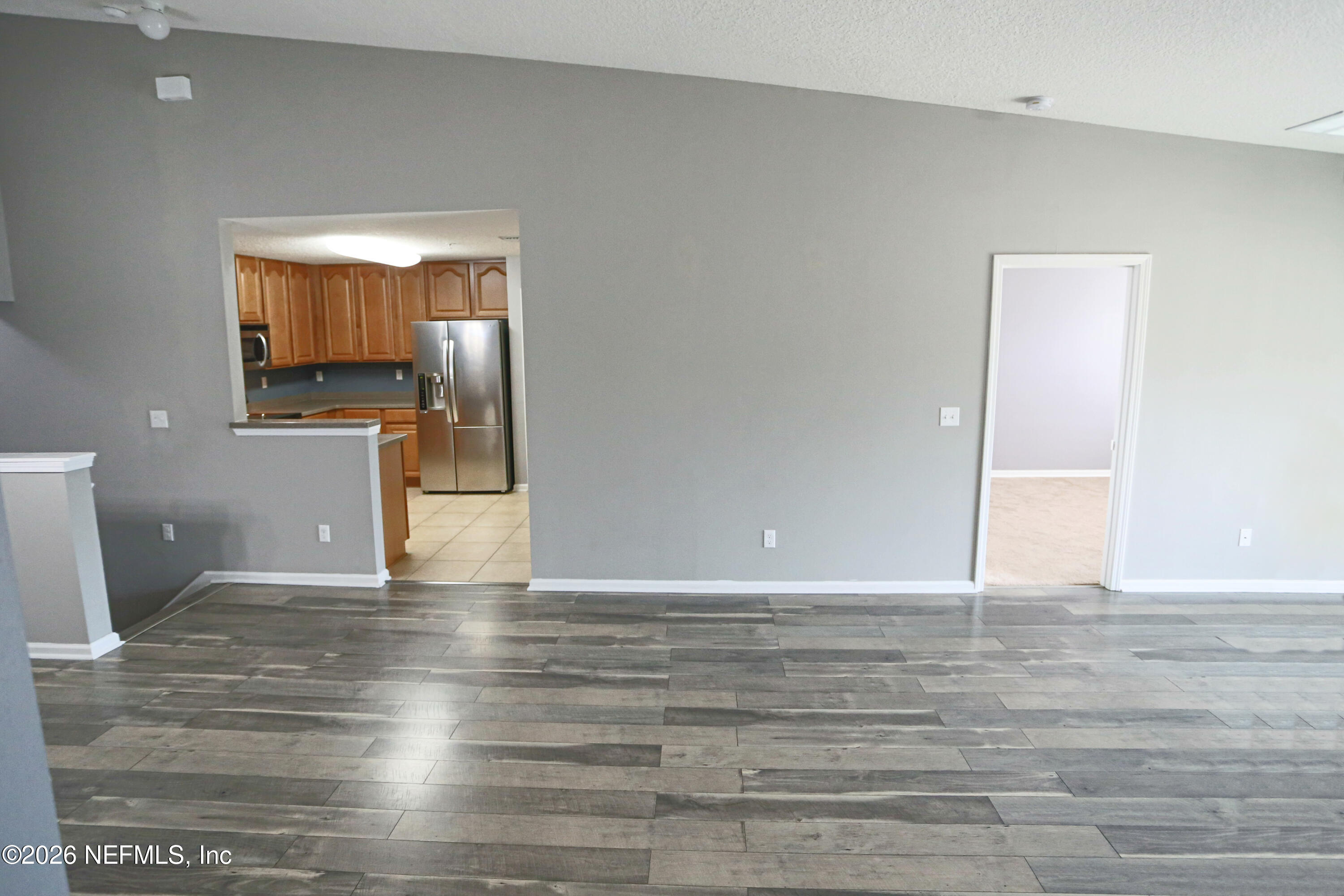 904 Golden Lake Loop St. Augustine, FL 32084 - Photo 9 of 43 Dining room to Kitchen