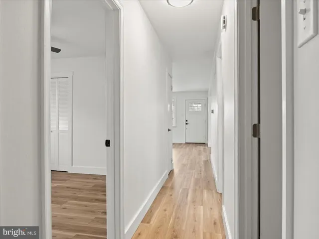 a view of a bedroom from the hallway