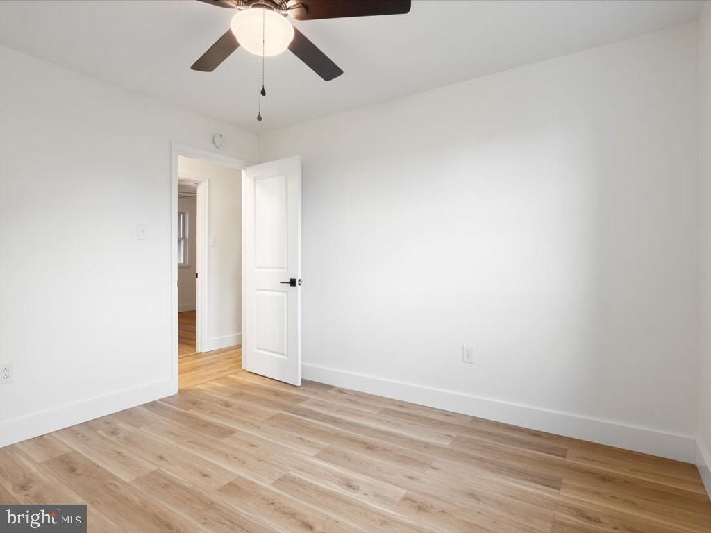 1310 Delaware Lane, Unit A Hagerstown, MD 21740 - Photo 14 of 24 wooden floor in an empty room