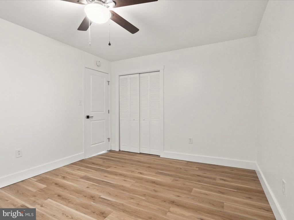 1310 Delaware Lane, Unit A Hagerstown, MD 21740 - Photo 17 of 24 a view of empty room with wooden floor