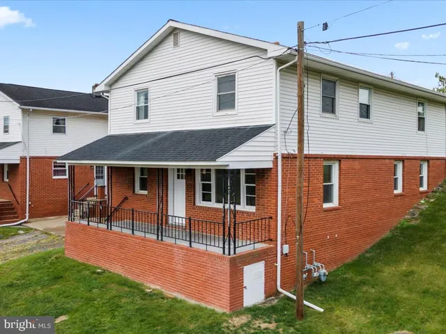 a view of a house with patio