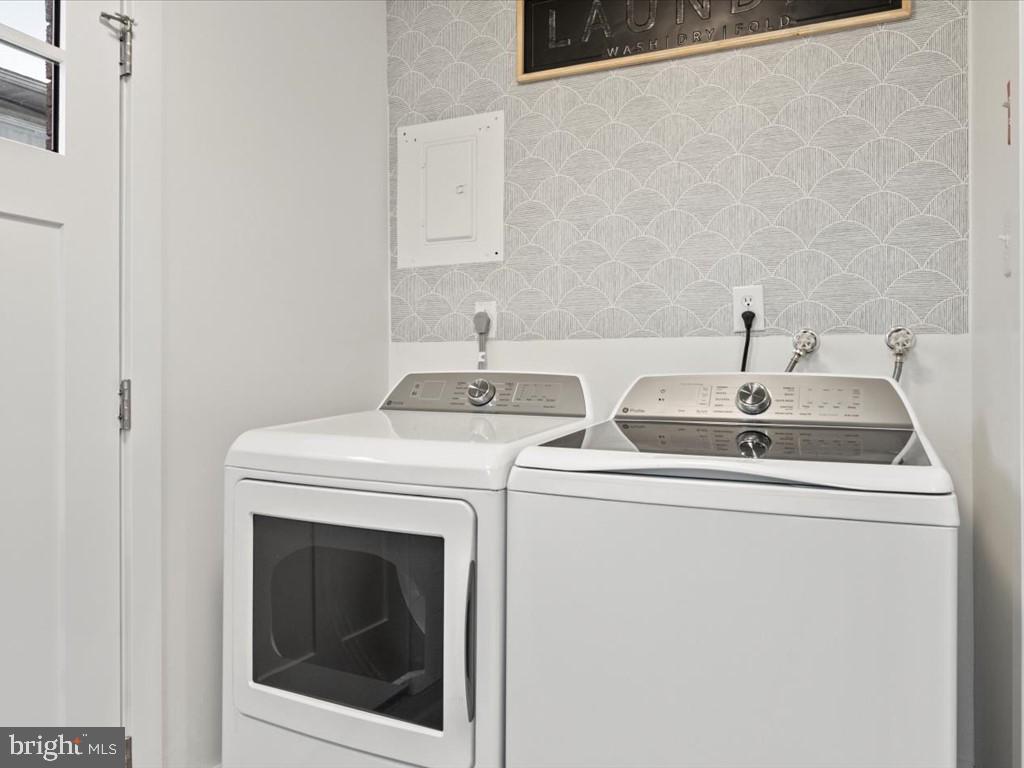 1310 Delaware Lane, Unit A Hagerstown, MD 21740 - Photo 5 of 24 a utility room with dryer and washer