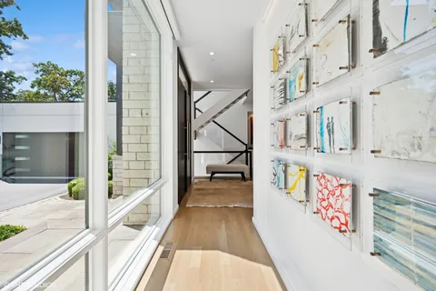 a view of a balcony with car parked