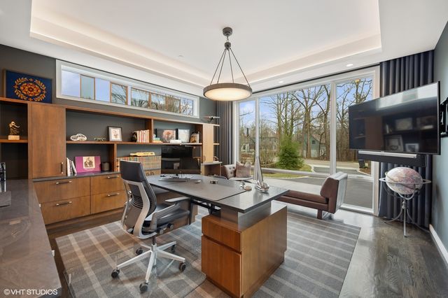 a workspace with furniture window and outside view