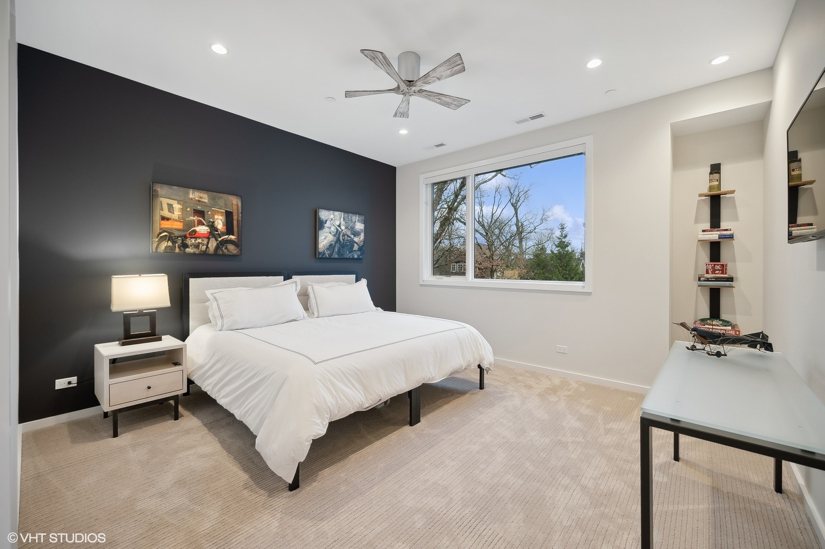 133 Timber Lane Glencoe, IL 60022 - Photo 29 of 45 a bedroom with a large bed and a chandelier