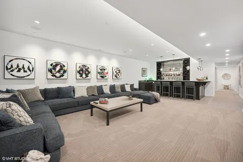 a living room with furniture and a table