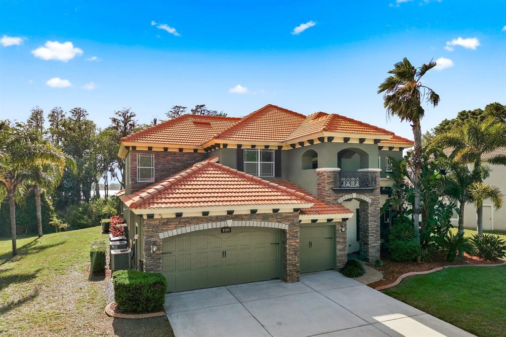 9103 Creedmoor Lane New Port Richey, FL 34654 - Photo 67 of 90 a view of a house with a yard