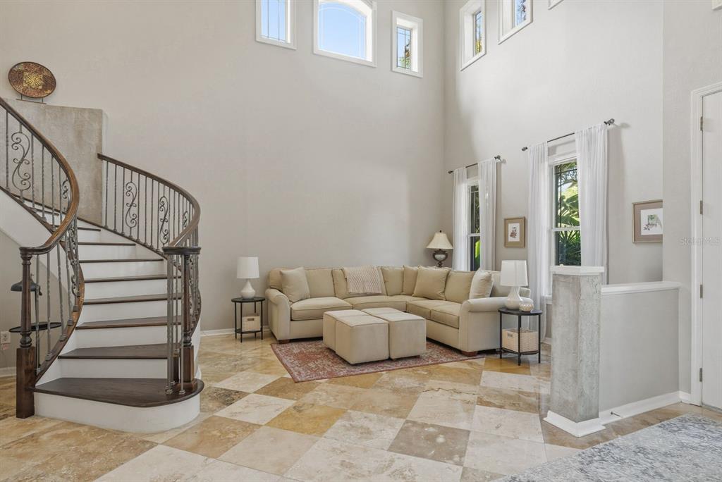 9103 Creedmoor Lane New Port Richey, FL 34654 - Photo 7 of 90 a living room with furniture and wooden floor