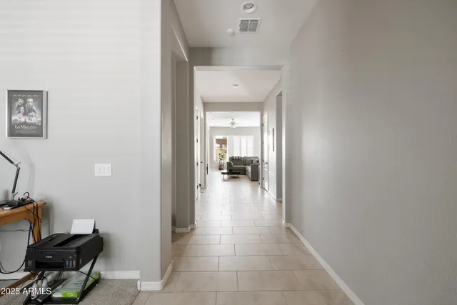 a view of a hallway with workspace