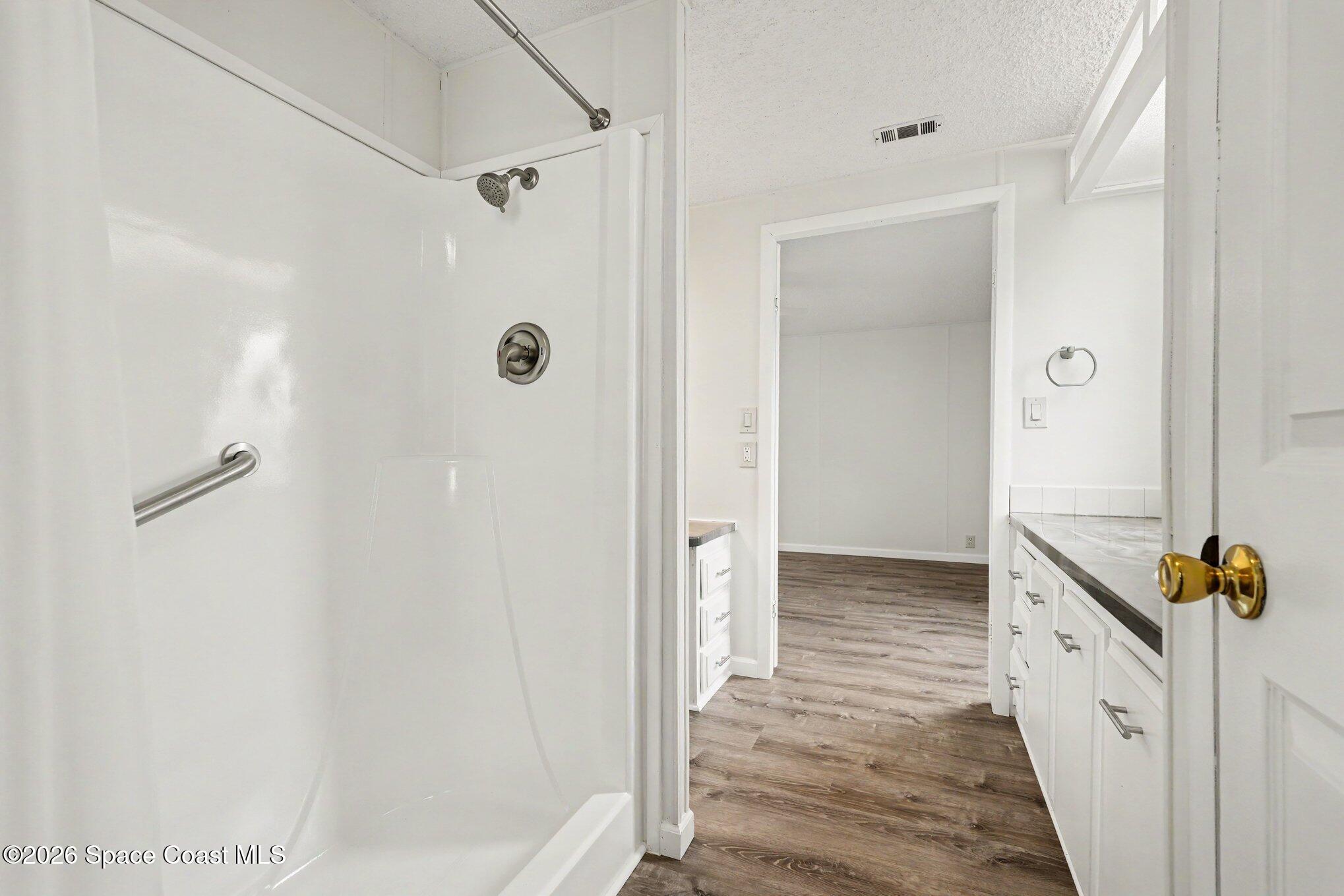 604 Breezeway Drive Cocoa, FL 32926 - Photo 18 of 26 Primary Bathroom Shower