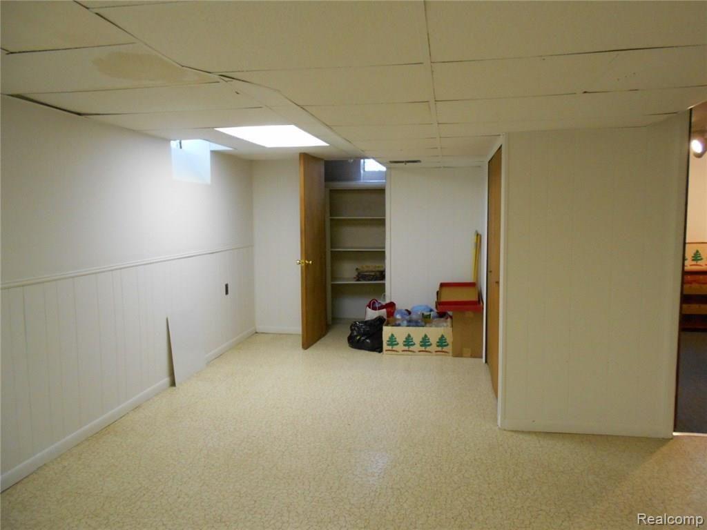 2060 Chalet Drive Rochester, MI 48309 - Photo 23 of 26 Partially finished basement with tons of storage!