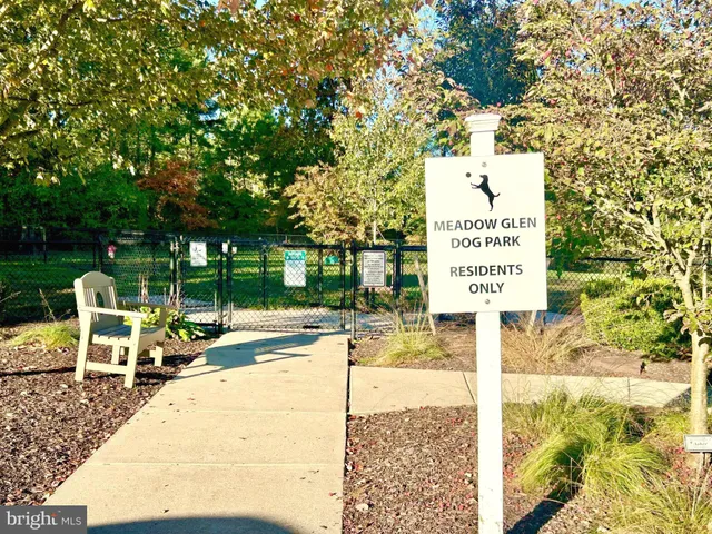a view of a park with swings