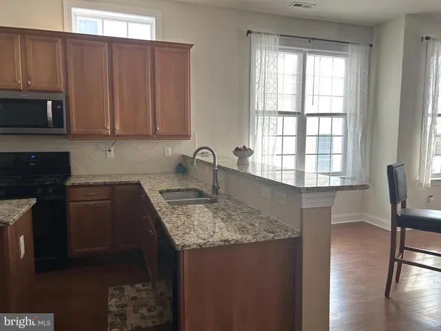 a view of a park with swings