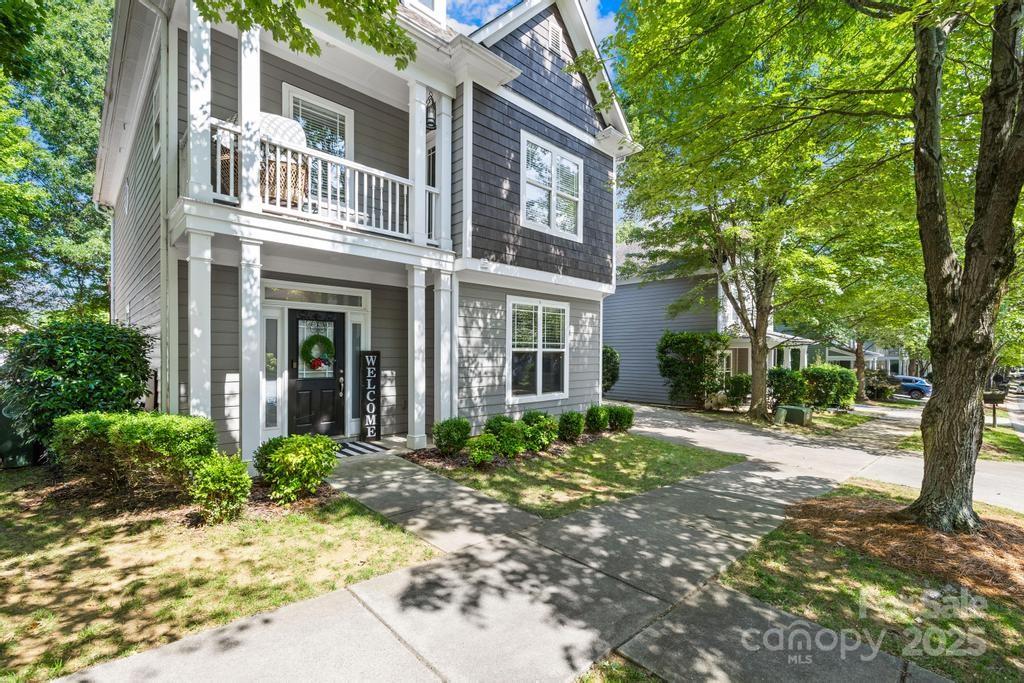 18810 Coachmans Trace Cornelius, NC 28031 - Photo 2 of 30 a front view of a house with garden