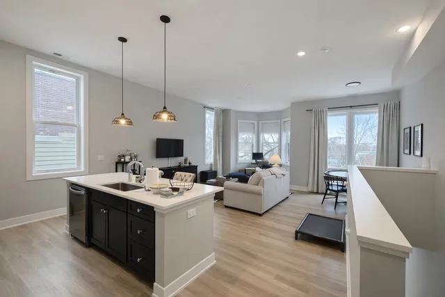 a view of living room with furniture and window