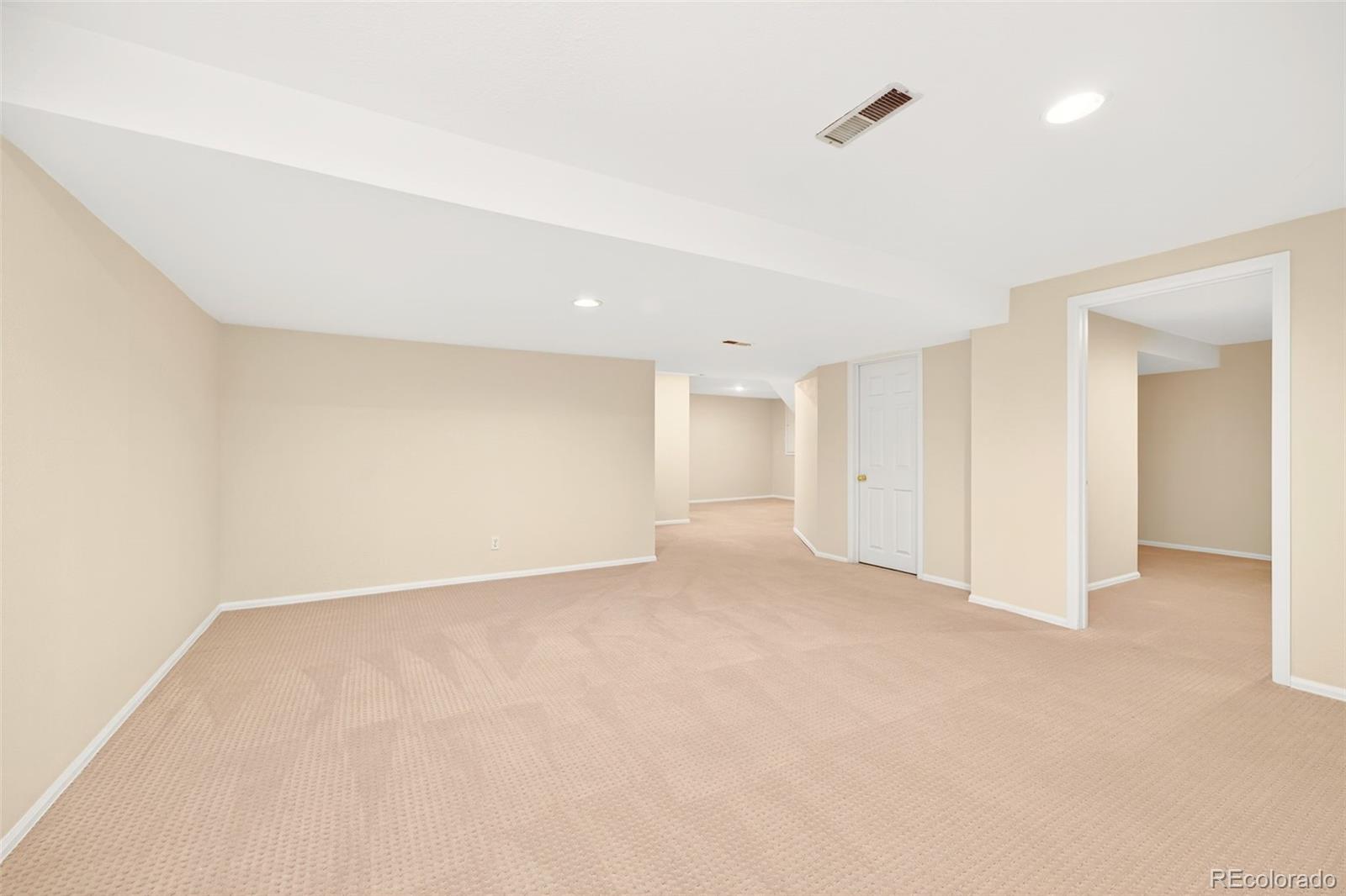 8852 Chestnut Hill Lane Highlands Ranch, CO 80130 - Photo 26 of 38 a view of an empty room