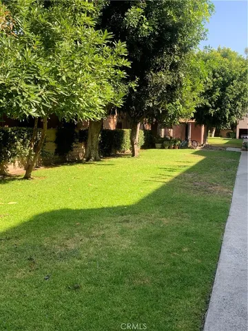 a kitchen with a stove a sink and a microwave