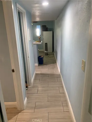 a bed room with a bed and a window