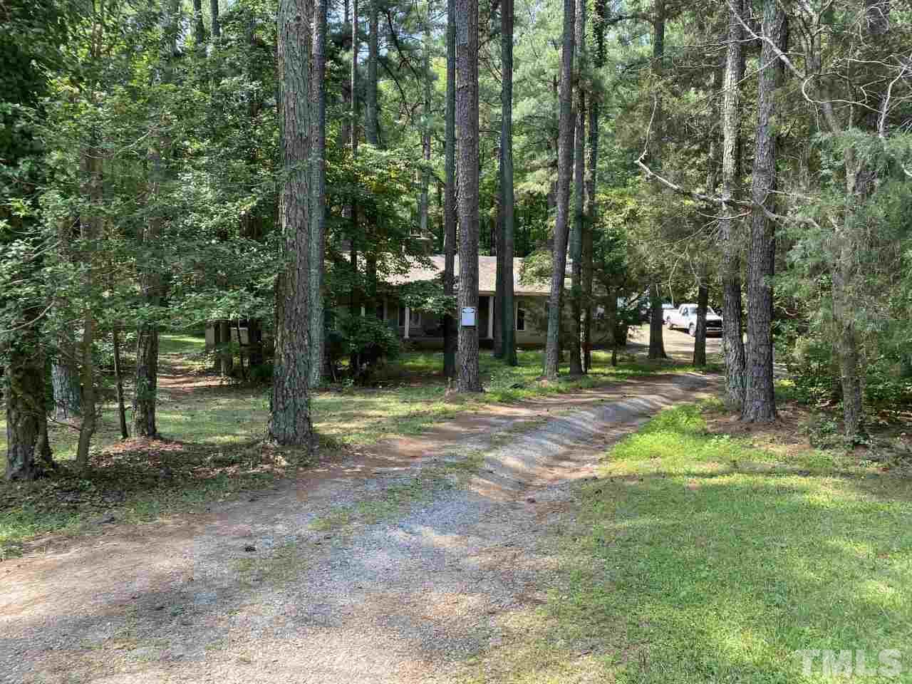 10021 Ray Road Raleigh, NC 27613 - Photo 14 of 19 a view of outdoor space with trees all around