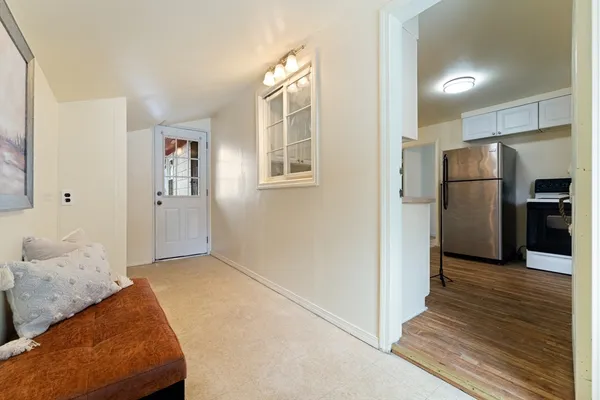 a view of livingroom with furniture and wooden floor