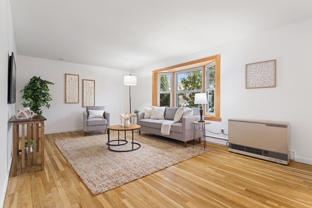 35 Dustin Street Worcester, MA 01604 - Photo 5 of 32 a living room with furniture and a large window