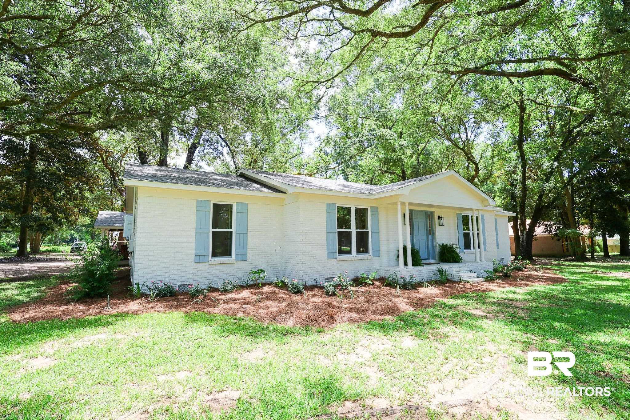 12190 Pecan Grove Street Magnolia Springs, AL 36555 - Photo 36 of 45 Ranch-style home featuring a front lawn