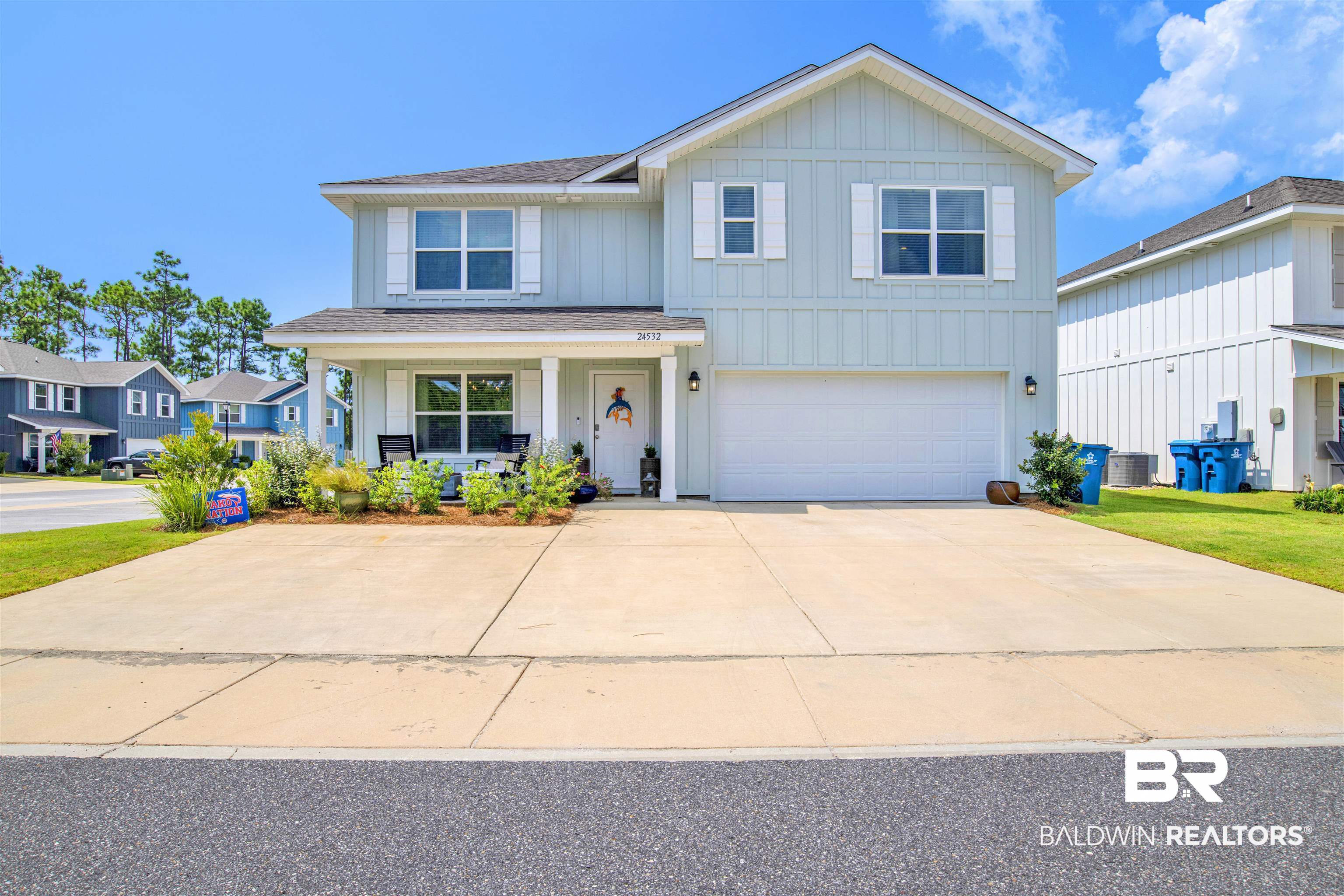 24532 Broken Sound Loop Orange Beach, AL 36561 - Photo 1 of 29 View of front of home with 2 car garage