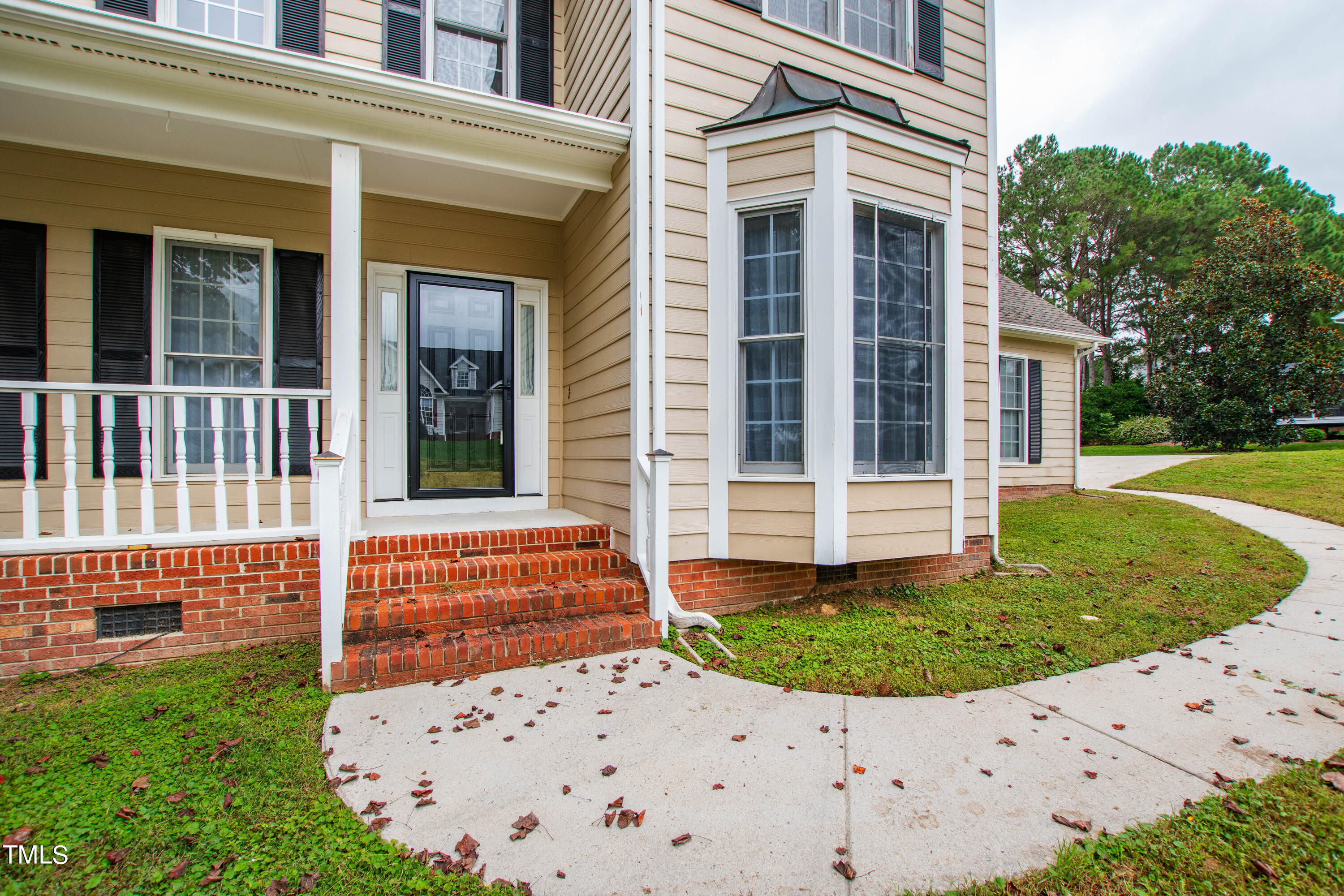 4305 Riverport Road Raleigh, NC 27616 - Photo 2 of 43 front view of a house with a yard
