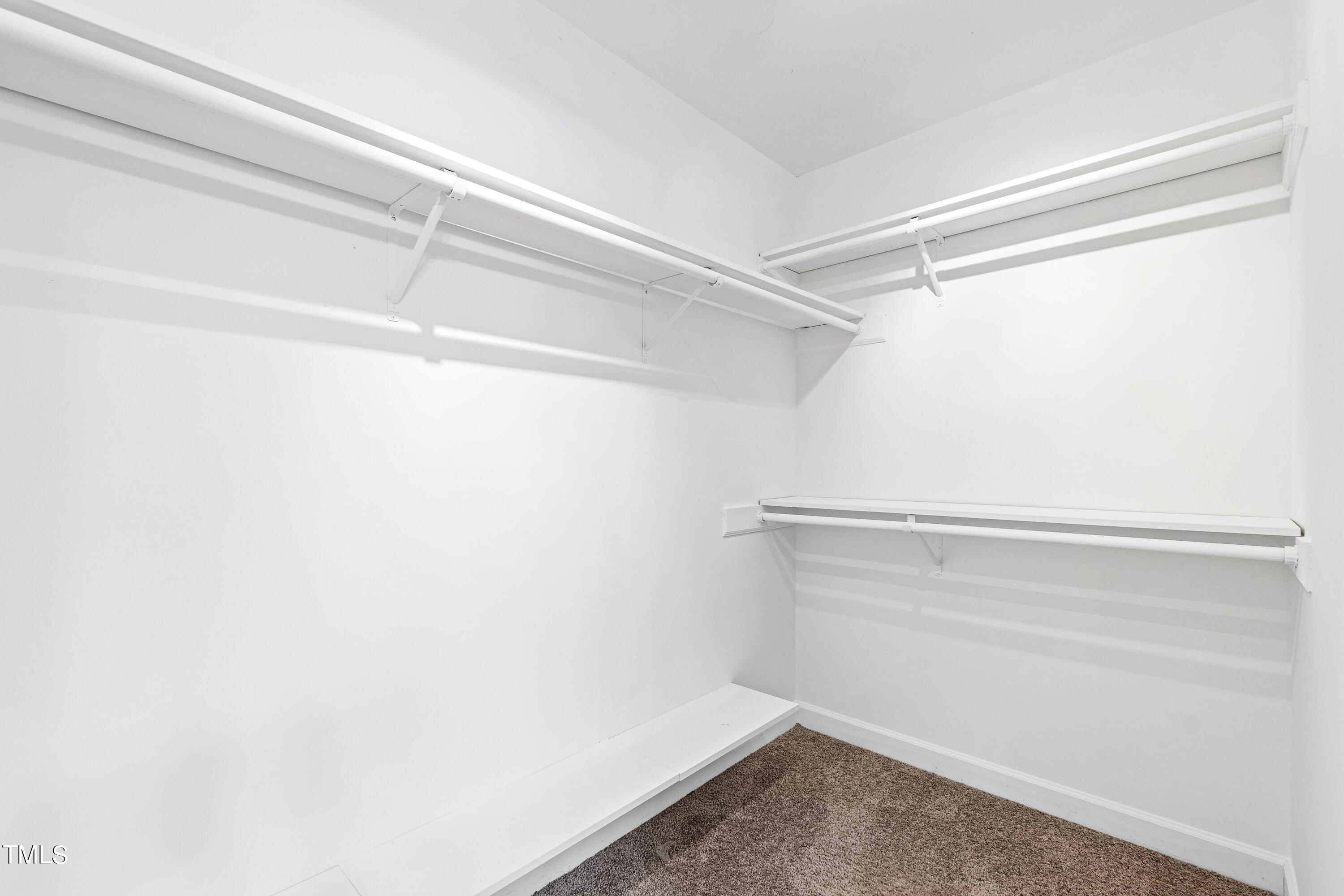 4305 Riverport Road Raleigh, NC 27616 - Photo 26 of 43 a view of an empty walk in closet