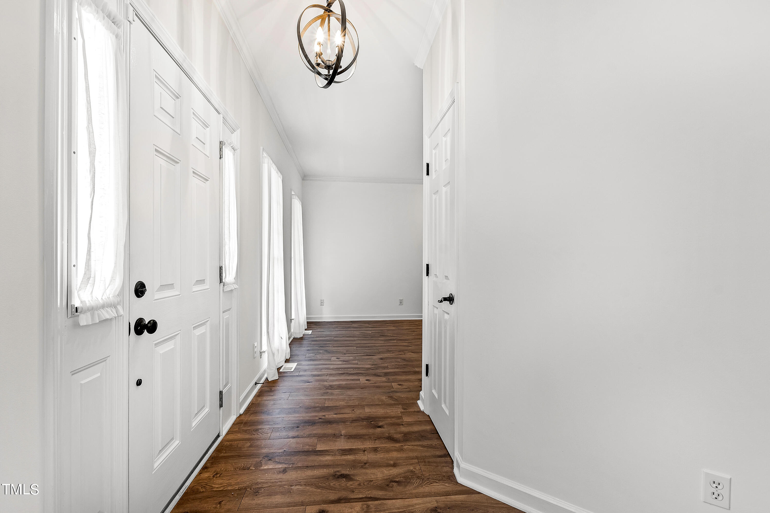 4305 Riverport Road Raleigh, NC 27616 - Photo 3 of 43 a view of a hallway with wooden floor