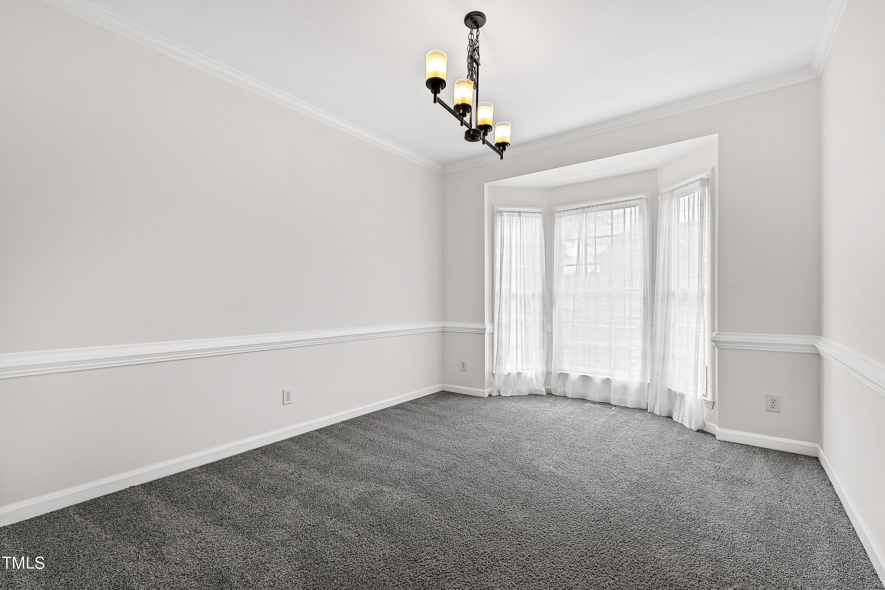4305 Riverport Road Raleigh, NC 27616 - Photo 5 of 43 a view of an empty room with a window