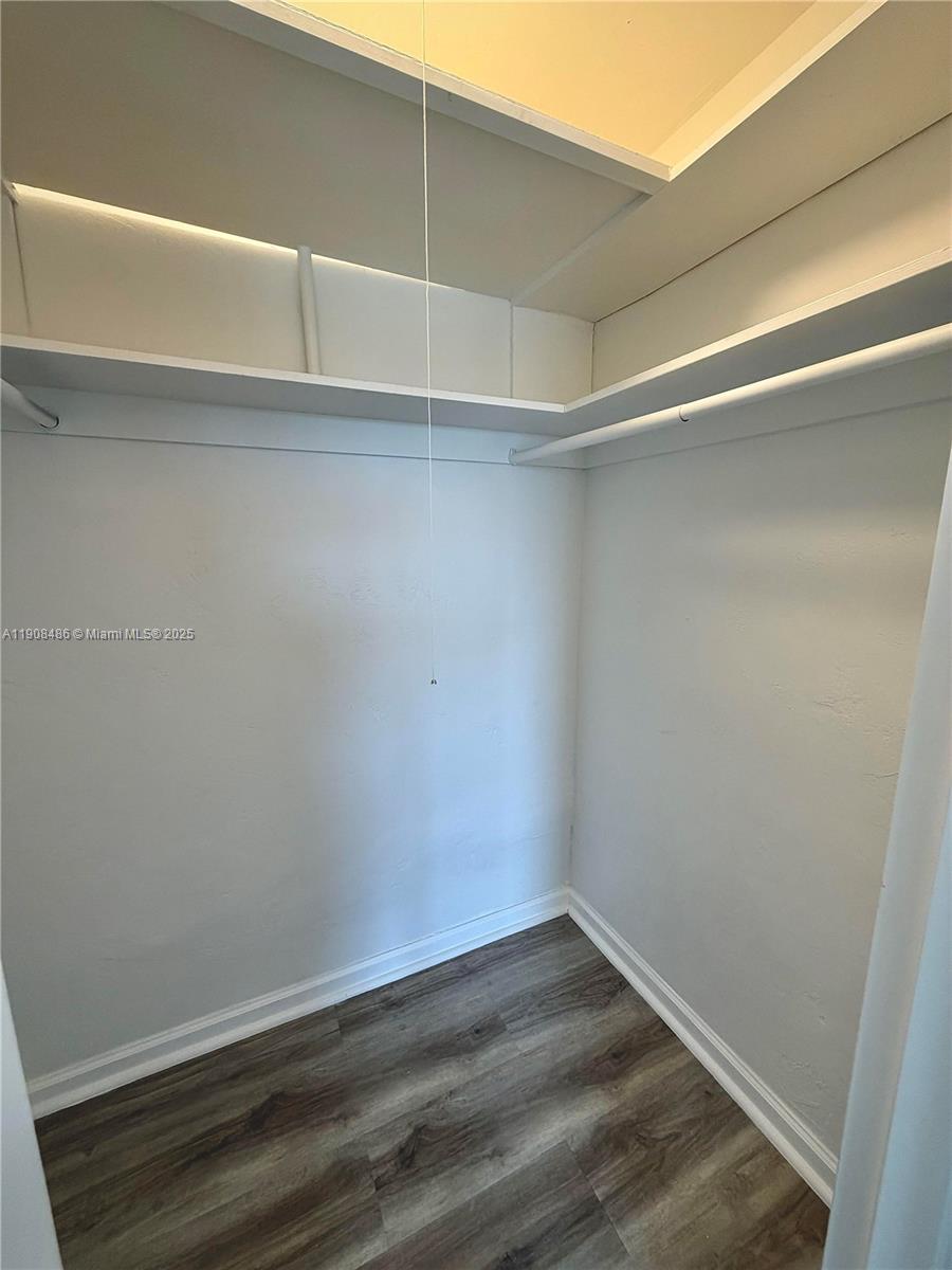 8000 Harding Avenue, Unit 5C Miami Beach, FL 33141 - Photo 7 of 13 a view of an empty room