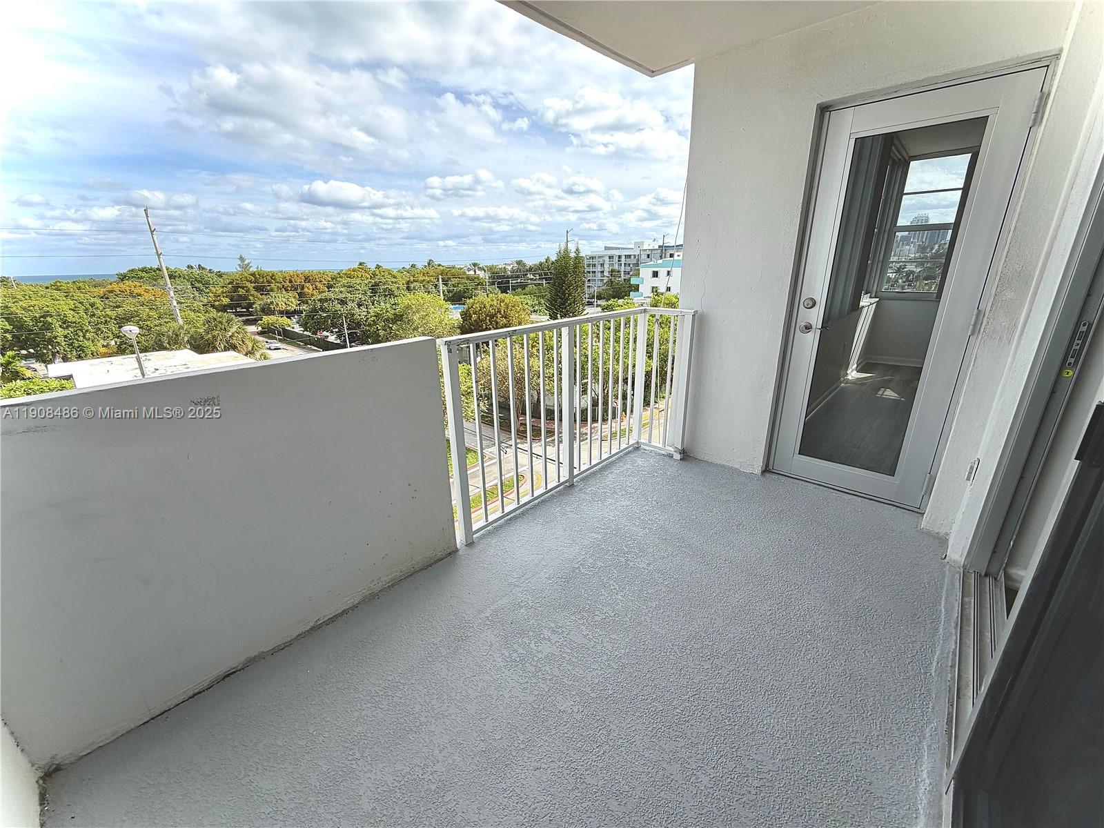 8000 Harding Avenue, Unit 5C Miami Beach, FL 33141 - Photo 9 of 13 a view of balcony and city view