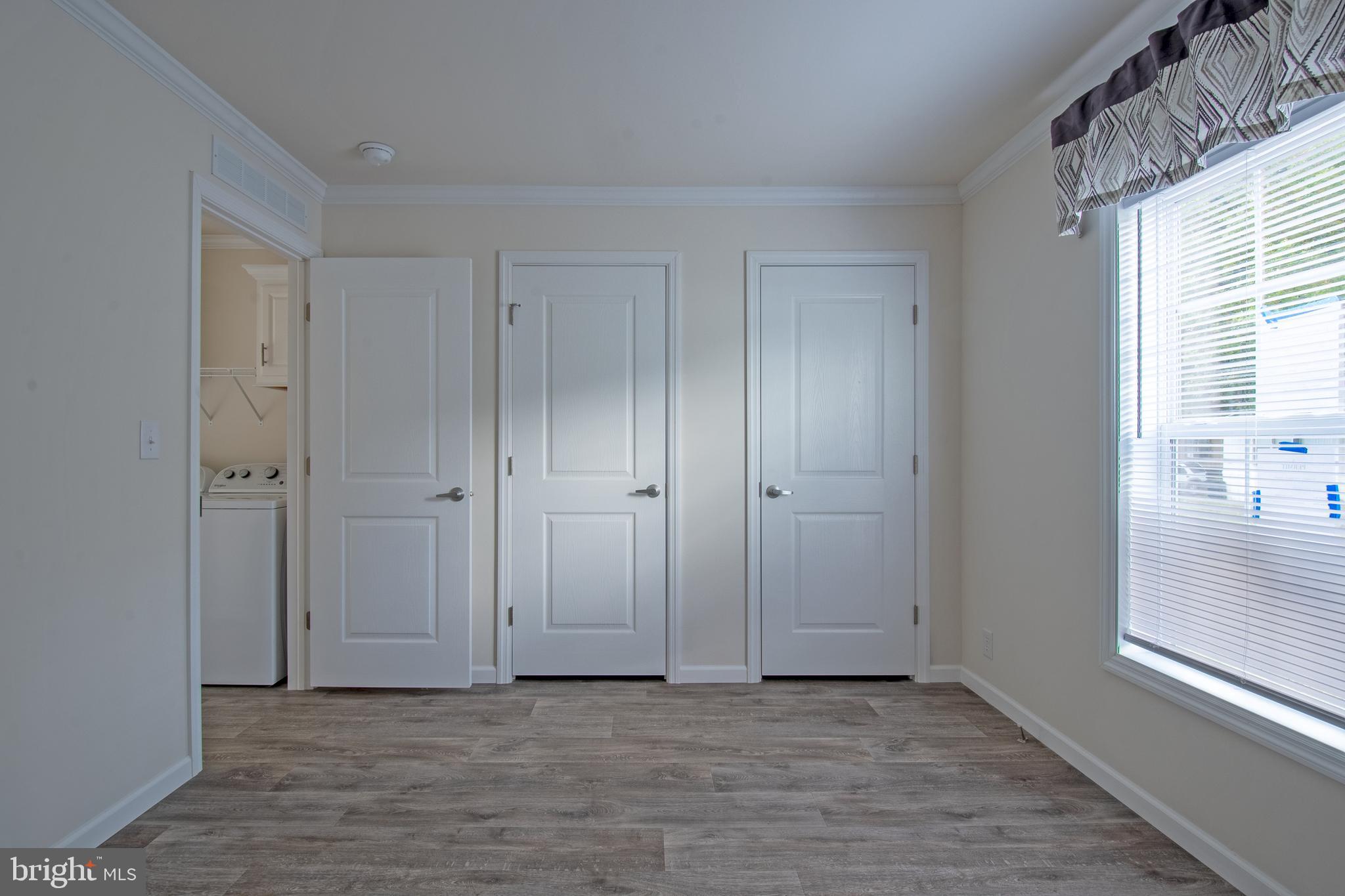 91 Longbow Lane Hartly, DE 19953 - Photo 20 of 21 a view of an empty room and window