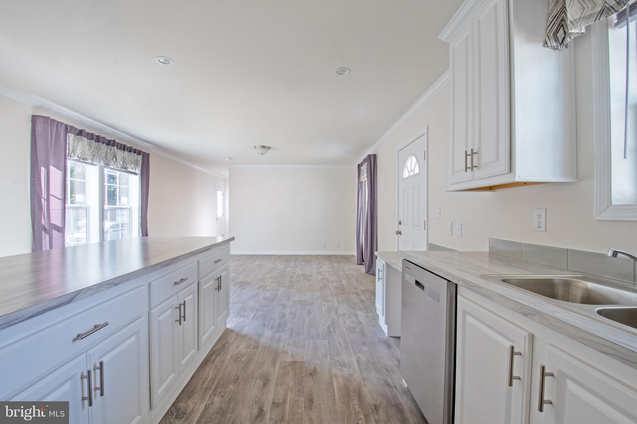 91 Longbow Lane Hartly, DE 19953 - Photo 5 of 21 a view of a kitchen with electric appliances