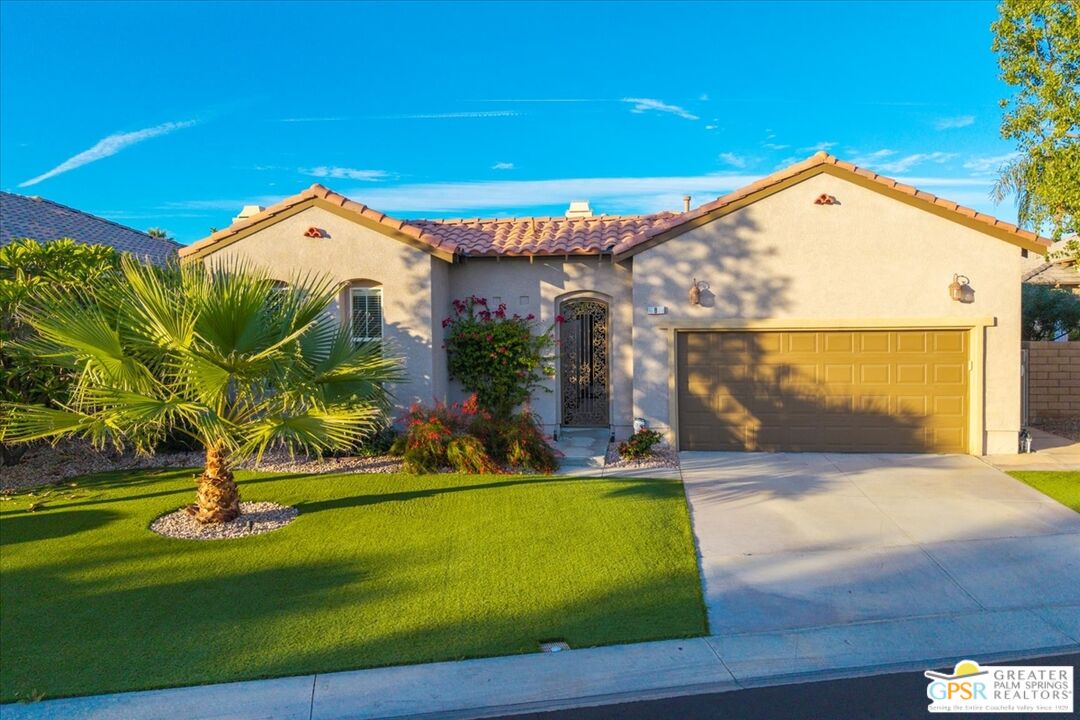 8 Lake Como Court Rancho Mirage, CA 92270 - Photo 3 of 63 a view of swimming pool with outdoor seating and house in the background