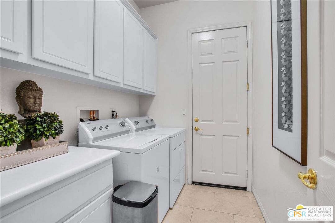 8 Lake Como Court Rancho Mirage, CA 92270 - Photo 34 of 63 a utility room with dryer and washer